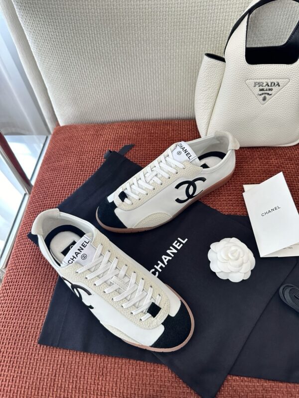 Chanel White and Black Cap-Toe Low-Top Sneaker with Suede Detailing