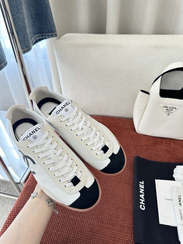 Chanel White and Black Cap-Toe Low-Top Sneaker with Suede Detailing