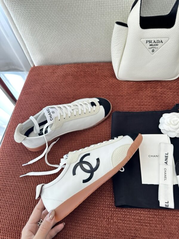 Chanel White and Black Cap-Toe Low-Top Sneaker with Suede Detailing