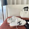 Chanel White and Black Cap-Toe Low-Top Sneaker with Suede Detailing