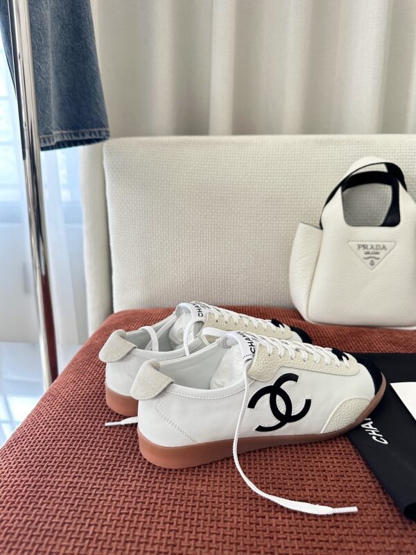 Chanel White and Black Cap-Toe Low-Top Sneaker with Suede Detailing