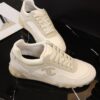 Chanel Beige and Off-White Mixed Material Low-Top Sneaker with Suede and CC Logo