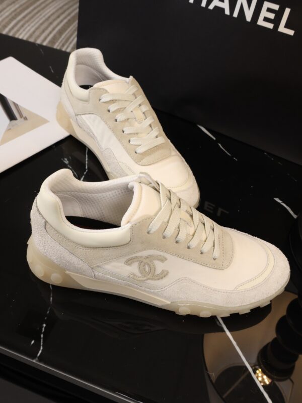Chanel Beige and Off-White Mixed Material Low-Top Sneaker with Suede and CC Logo
