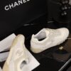 Chanel Beige and Off-White Mixed Material Low-Top Sneaker with Suede and CC Logo