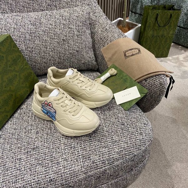 sy_no_3CAEFAC87239523EB793FEB21859A97A_4 Gucci Off-White Chunky Sneaker with Cute Cartoon Dog Graphic