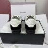 Chanel Silver Metallic Quilted Leather and Black Suede Low-Top Sneaker with CC Logo