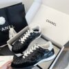 Chanel Black Quilted Leather Low-Top Sneaker with White Laces and CC Logo