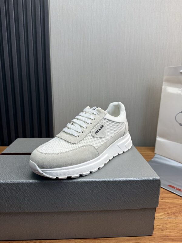 sy_no_457FF2E8CA4F234A8B06F0B6426FA825_0 Prada White Mesh Suede-Spliced Triangle Logo Low-Top Sneaker