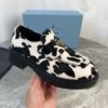 Prada Cow Print Pony Hair Platform Loafer