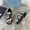 Prada Cow Print Pony Hair Platform Loafer