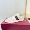 sy_no_468437157BA20687B86D2760B0D06FDF_2 Gucci Perforated GG Leather Sneaker with Web Stripe