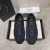 sy_no_46BA6ED7FEFA6AE4EA34F459B0EEEC3C_0 Prada Navy Suede Gold Logo Trainer