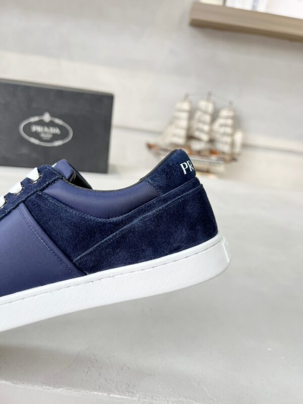 sy_no_49F00F71CBC0A2AF6CEBD2CA6D0ED0AA_1 Prada Navy Suede Low-Top Casual Trainer