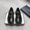 sy_no_4BCFEB4E3C031C369D9B33E00837FEA9_0 Chanel Black Platform Loafer with Gold-Tone Metal Lettering