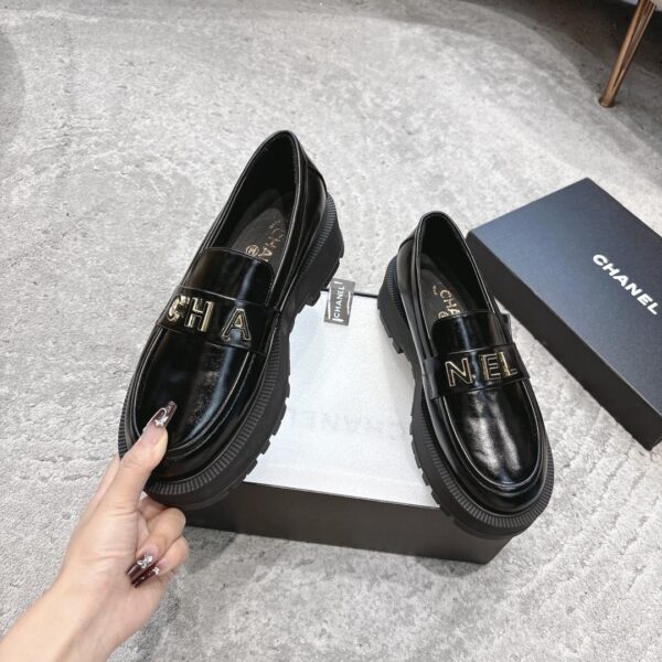 sy_no_4BCFEB4E3C031C369D9B33E00837FEA9_1 Chanel Black Platform Loafer with Gold-Tone Metal Lettering