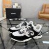 sy_no_4EC2EE923632FAB90C4C005F8F34B381_0 Chanel Black & White Chunky Sneaker with Silver Accents & Interlocking CC Logo