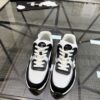 sy_no_4EC2EE923632FAB90C4C005F8F34B381_2 Chanel Black & White Chunky Sneaker with Silver Accents & Interlocking CC Logo