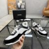 sy_no_4EC2EE923632FAB90C4C005F8F34B381_3 Chanel Black & White Chunky Sneaker with Silver Accents & Interlocking CC Logo