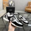 sy_no_4EC2EE923632FAB90C4C005F8F34B381_4 Chanel Black & White Chunky Sneaker with Silver Accents & Interlocking CC Logo