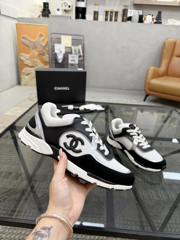 sy_no_4EC2EE923632FAB90C4C005F8F34B381_4 Chanel Black & White Chunky Sneaker with Silver Accents & Interlocking CC Logo
