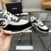 sy_no_4EC2EE923632FAB90C4C005F8F34B381_5 Chanel Black & White Chunky Sneaker with Silver Accents & Interlocking CC Logo