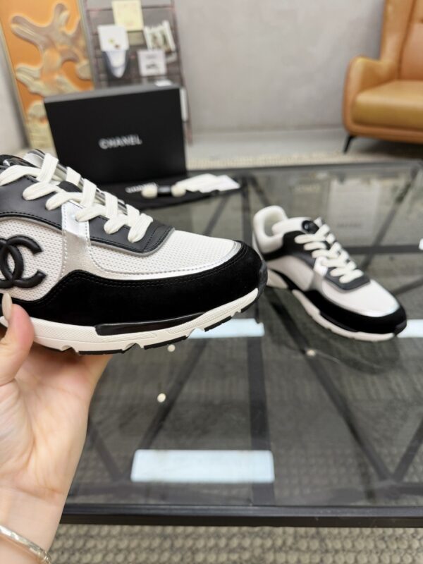 sy_no_4EC2EE923632FAB90C4C005F8F34B381_5 Chanel Black & White Chunky Sneaker with Silver Accents & Interlocking CC Logo
