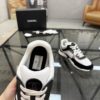 sy_no_4EC2EE923632FAB90C4C005F8F34B381_6 Chanel Black & White Chunky Sneaker with Silver Accents & Interlocking CC Logo