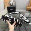 sy_no_4EC2EE923632FAB90C4C005F8F34B381_8 Chanel Black & White Chunky Sneaker with Silver Accents & Interlocking CC Logo