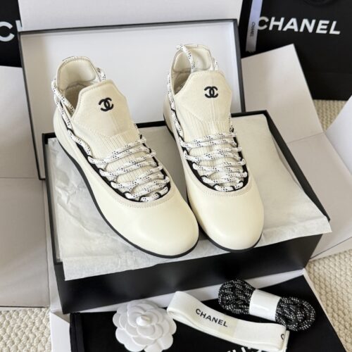 sy_no_4ECFFEC9493623F806A804E19FAFC83C_0 Chanel White Leather and Knit Slip-On Low-Top Sneaker with Speckled Laces and CC Logo