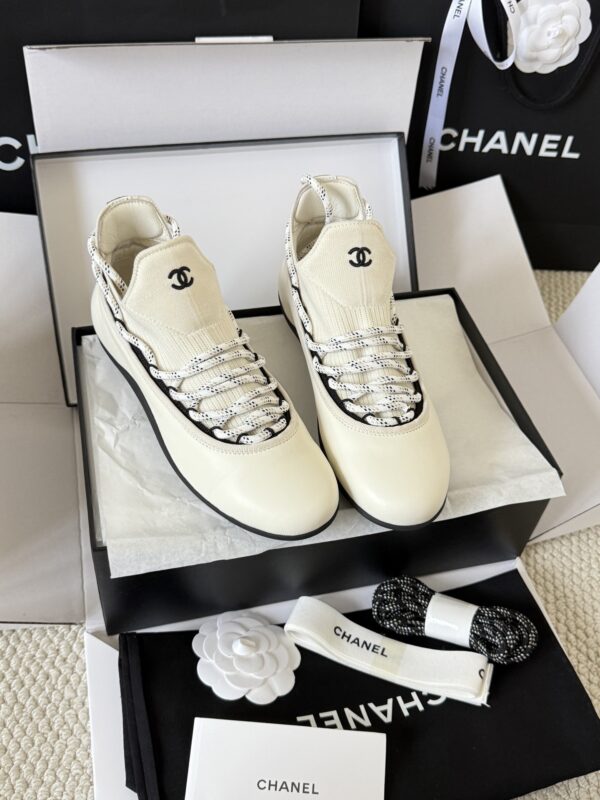 sy_no_4ECFFEC9493623F806A804E19FAFC83C_0 Chanel White Leather and Knit Slip-On Low-Top Sneaker with Speckled Laces and CC Logo