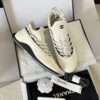 sy_no_4ECFFEC9493623F806A804E19FAFC83C_1 Chanel White Leather and Knit Slip-On Low-Top Sneaker with Speckled Laces and CC Logo