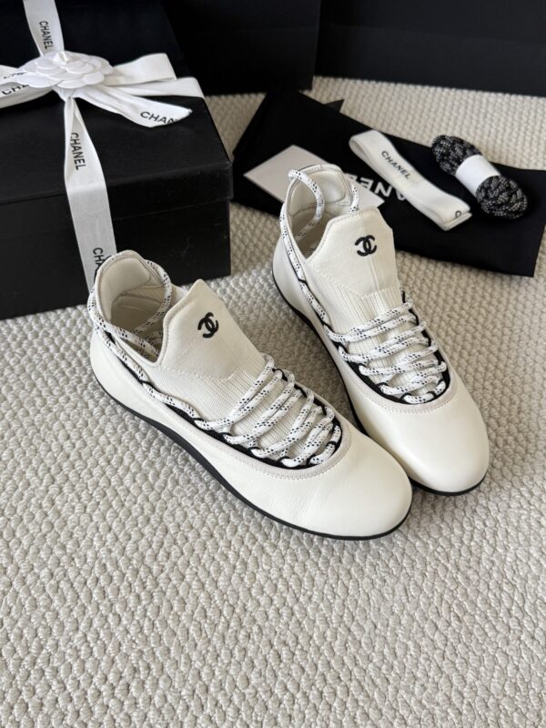 sy_no_4ECFFEC9493623F806A804E19FAFC83C_2 Chanel White Leather and Knit Slip-On Low-Top Sneaker with Speckled Laces and CC Logo