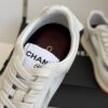 Chanel White and Grey Mesh and Suede Low-Top Sneaker with Black Toe Cap and CC Logo