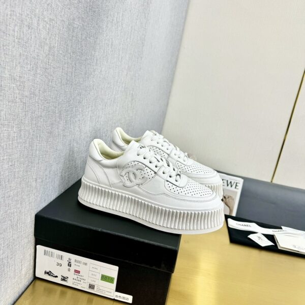 sy_no_509CAC2AF239607C0340A2E896A8C9F1_0 Chanel Off-White Leather Platform Low-Top Sneaker with Perforated CC Logo and Ribbed Sole