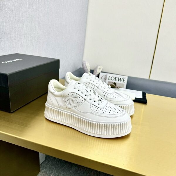 sy_no_509CAC2AF239607C0340A2E896A8C9F1_1 Chanel Off-White Leather Platform Low-Top Sneaker with Perforated CC Logo and Ribbed Sole