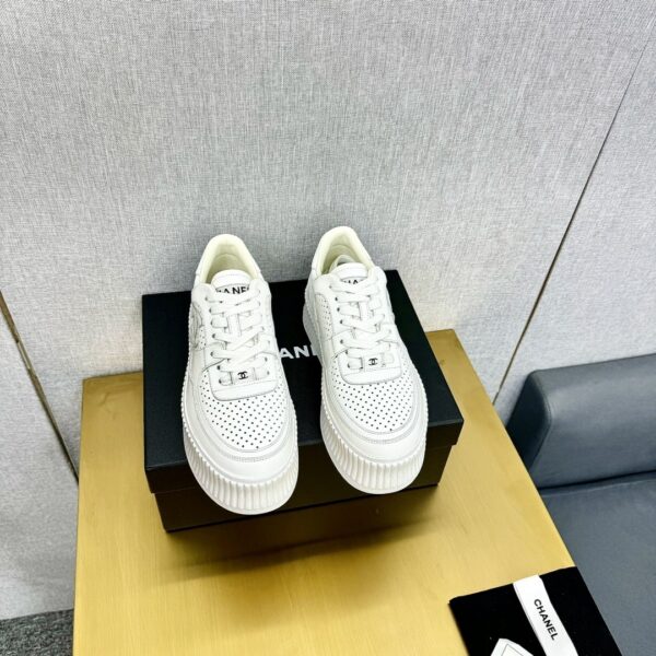 sy_no_509CAC2AF239607C0340A2E896A8C9F1_4 Chanel Off-White Leather Platform Low-Top Sneaker with Perforated CC Logo and Ribbed Sole