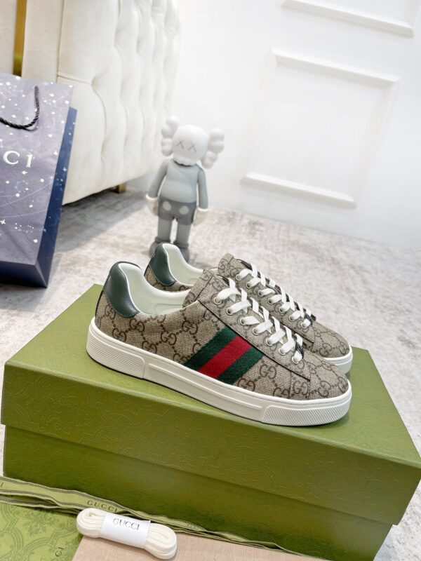 sy_no_50A03DABACE1793DB33D2E2F5B411E41_0 Gucci Screener GG Supreme Canvas Sneaker with Web Stripe