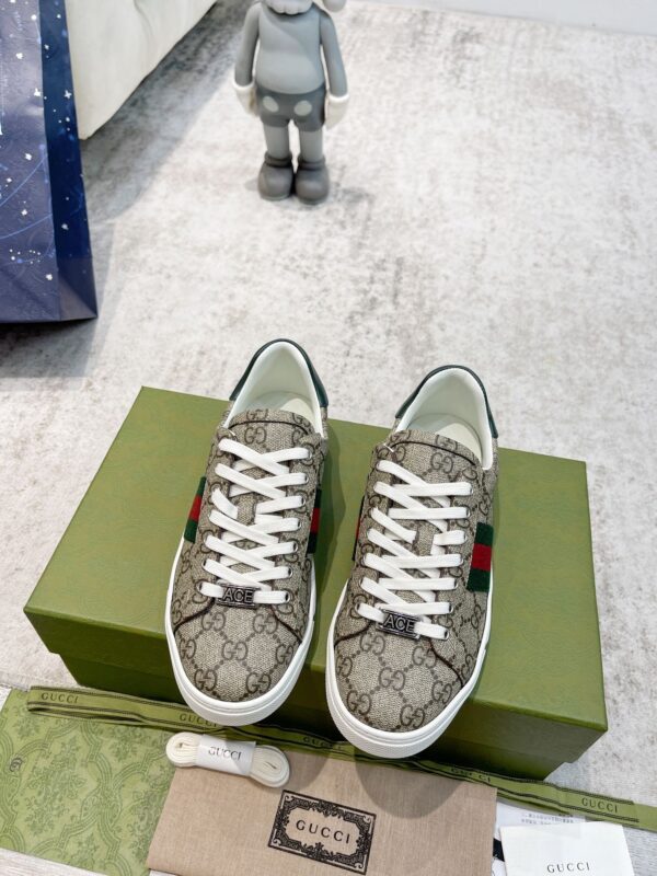 sy_no_50A03DABACE1793DB33D2E2F5B411E41_1 Gucci Screener GG Supreme Canvas Sneaker with Web Stripe