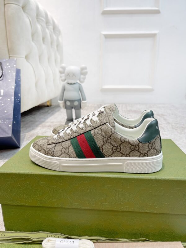 sy_no_50A03DABACE1793DB33D2E2F5B411E41_2 Gucci Screener GG Supreme Canvas Sneaker with Web Stripe