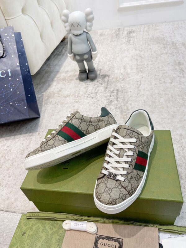 sy_no_50A03DABACE1793DB33D2E2F5B411E41_5 Gucci Screener GG Supreme Canvas Sneaker with Web Stripe