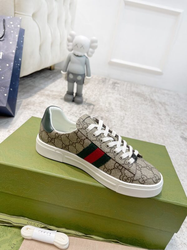 sy_no_50A03DABACE1793DB33D2E2F5B411E41_6 Gucci Screener GG Supreme Canvas Sneaker with Web Stripe