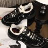 sy_no_523BE4E99C4E61DD3F343F5F8F08DFA5_1 Chanel Black and White Mixed Material Low-Top Sneaker with Contrast Piping and CC Logo