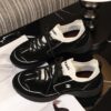 sy_no_523BE4E99C4E61DD3F343F5F8F08DFA5_2 Chanel Black and White Mixed Material Low-Top Sneaker with Contrast Piping and CC Logo