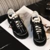 sy_no_523BE4E99C4E61DD3F343F5F8F08DFA5_3 Chanel Black and White Mixed Material Low-Top Sneaker with Contrast Piping and CC Logo