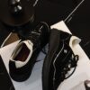 sy_no_523BE4E99C4E61DD3F343F5F8F08DFA5_4 Chanel Black and White Mixed Material Low-Top Sneaker with Contrast Piping and CC Logo