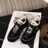 sy_no_523BE4E99C4E61DD3F343F5F8F08DFA5_7 Chanel Black and White Mixed Material Low-Top Sneaker with Contrast Piping and CC Logo