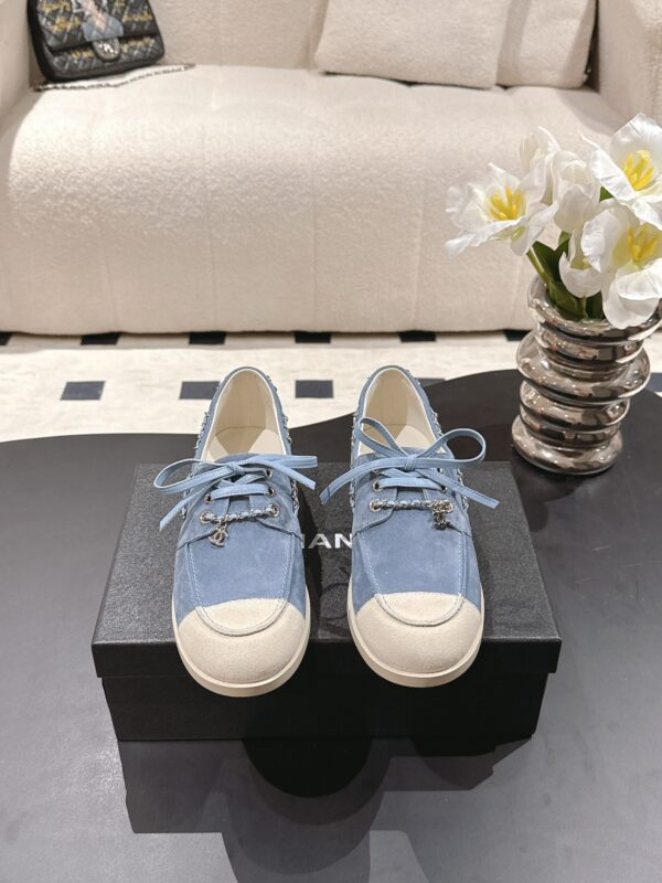 sy_no_5316C3E18E0FE2FA0BE943EF281AC671_0 Chanel Light Blue Suede Low-Top Shoe with Cap-Toe & CC Chain Detail