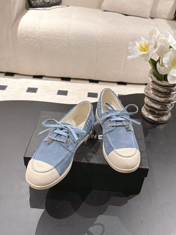 sy_no_5316C3E18E0FE2FA0BE943EF281AC671_1 Chanel Light Blue Suede Low-Top Shoe with Cap-Toe & CC Chain Detail