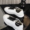 Chanel White and Black Mixed Material Low-Top Sneaker with Suede and CC Logo