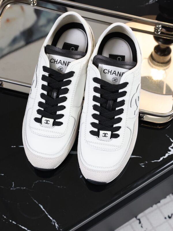 Chanel White and Black Mixed Material Low-Top Sneaker with Suede and CC Logo